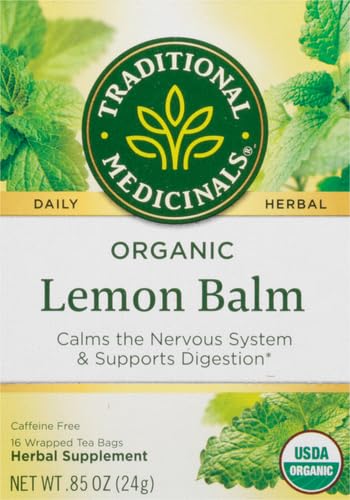 Steeping cup of Traditional Medicinals Lemon Balm tea with a soft lemon hue