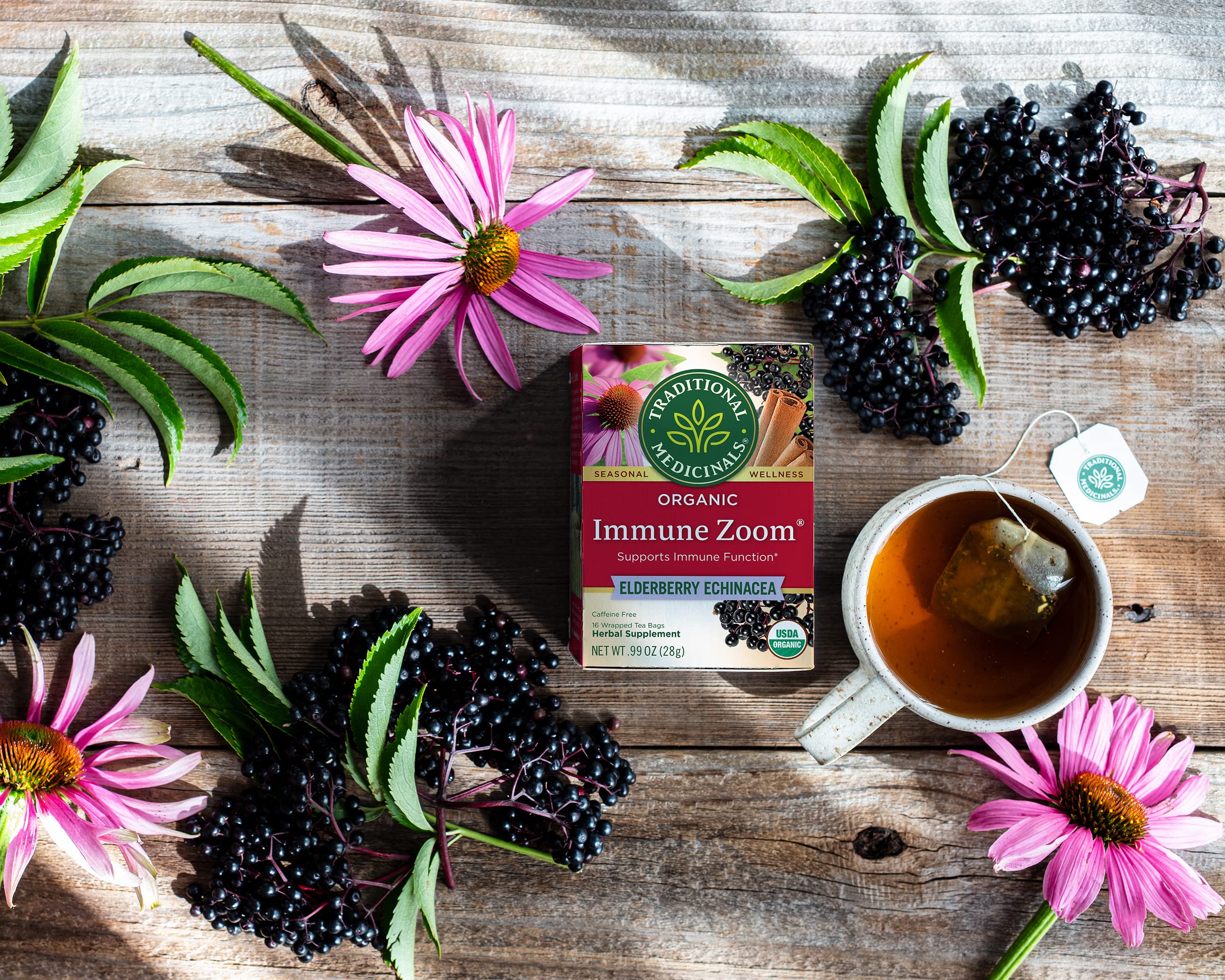 Brewed tea in a warm cup with steam and lemon aroma.