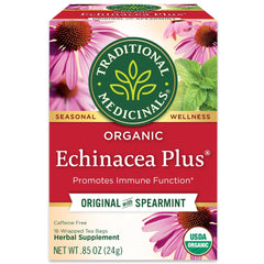 Traditional Medicinals Throat Coat tea bags in a cup, offering soothing comfort.
