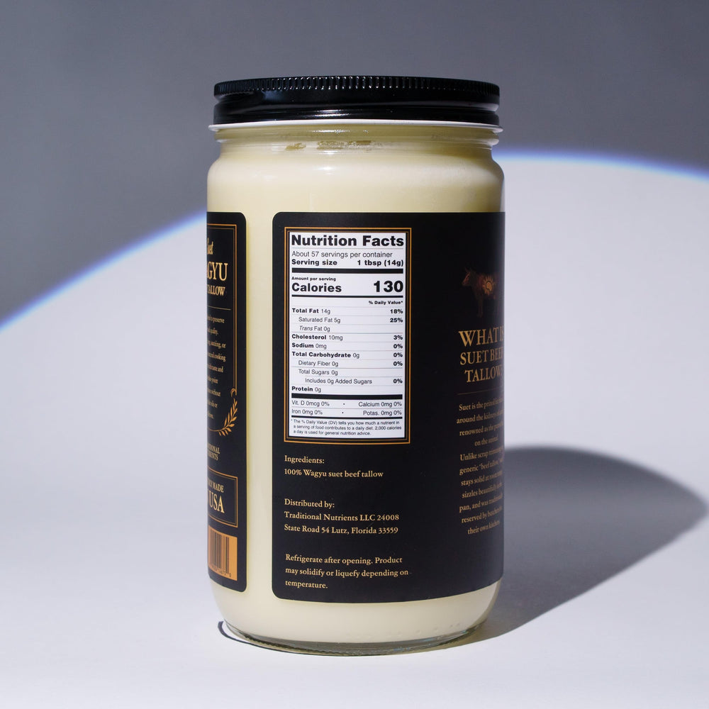 Traditional Nutrients Wagyu tallow in a raw suet block suggesting rich rendering.