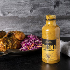 Traeger Liquid Gold BBQ Sauce on grilled chicken delivers tangy flavor.