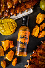 Traeger Mango Habanero Glaze on pork creates a sticky glaze with mango sweetness