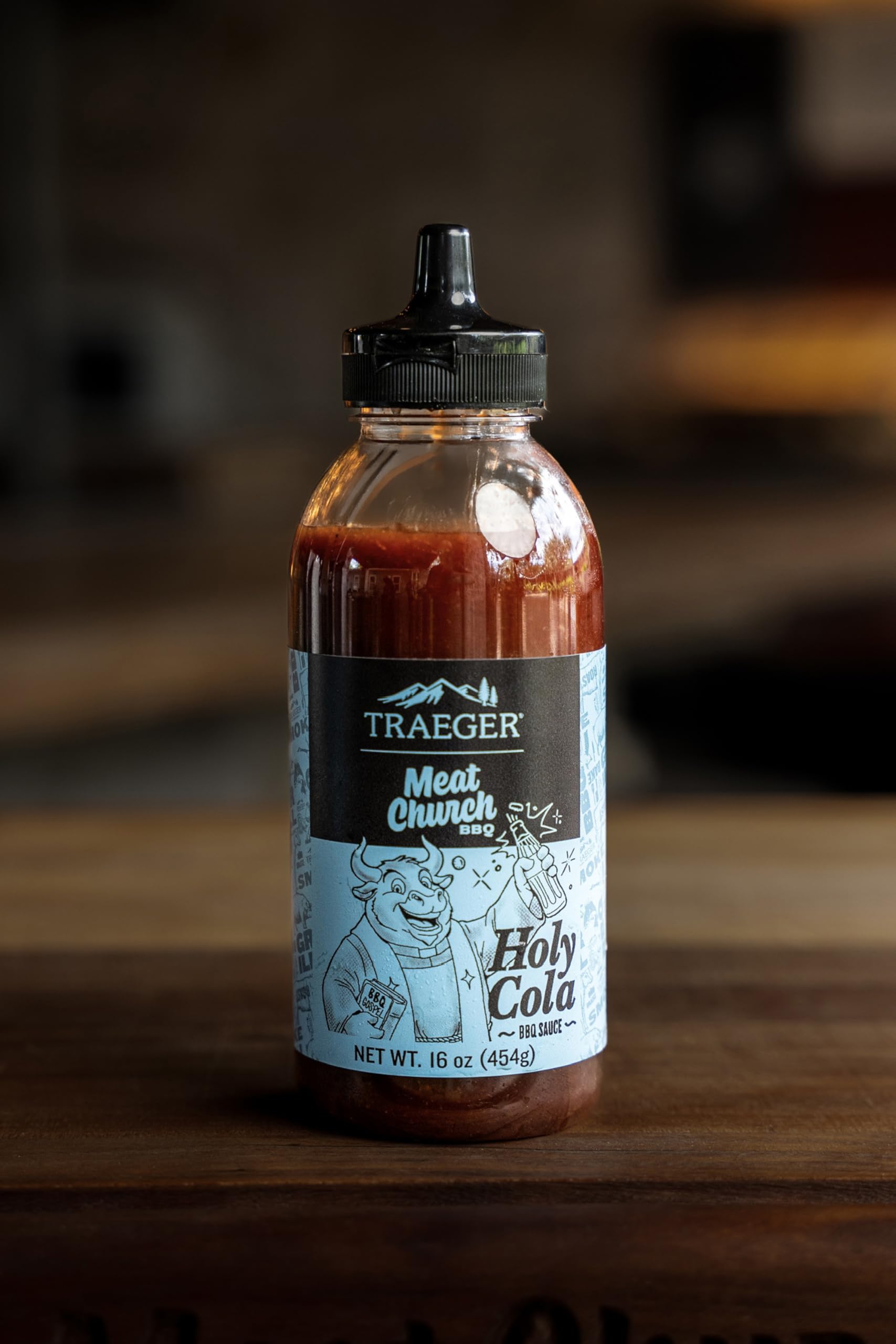 Traeger Meat Church Holy Cola BBQ Sauce on grilled chicken