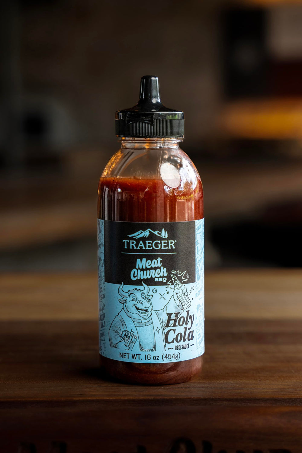 Traeger Meat Church Holy Cola BBQ Sauce on grilled chicken