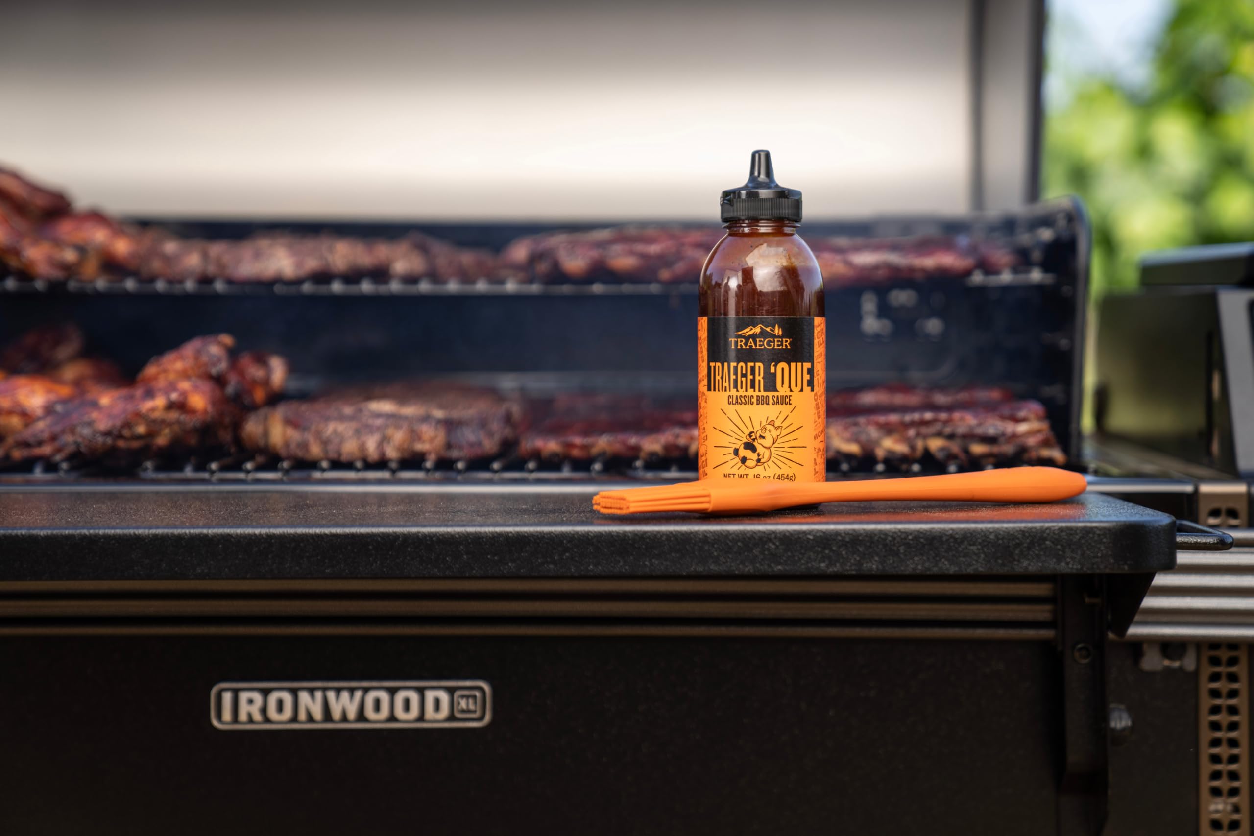 Traeger Que BBQ Sauce coats pulled pork with bold, juicy flavor.