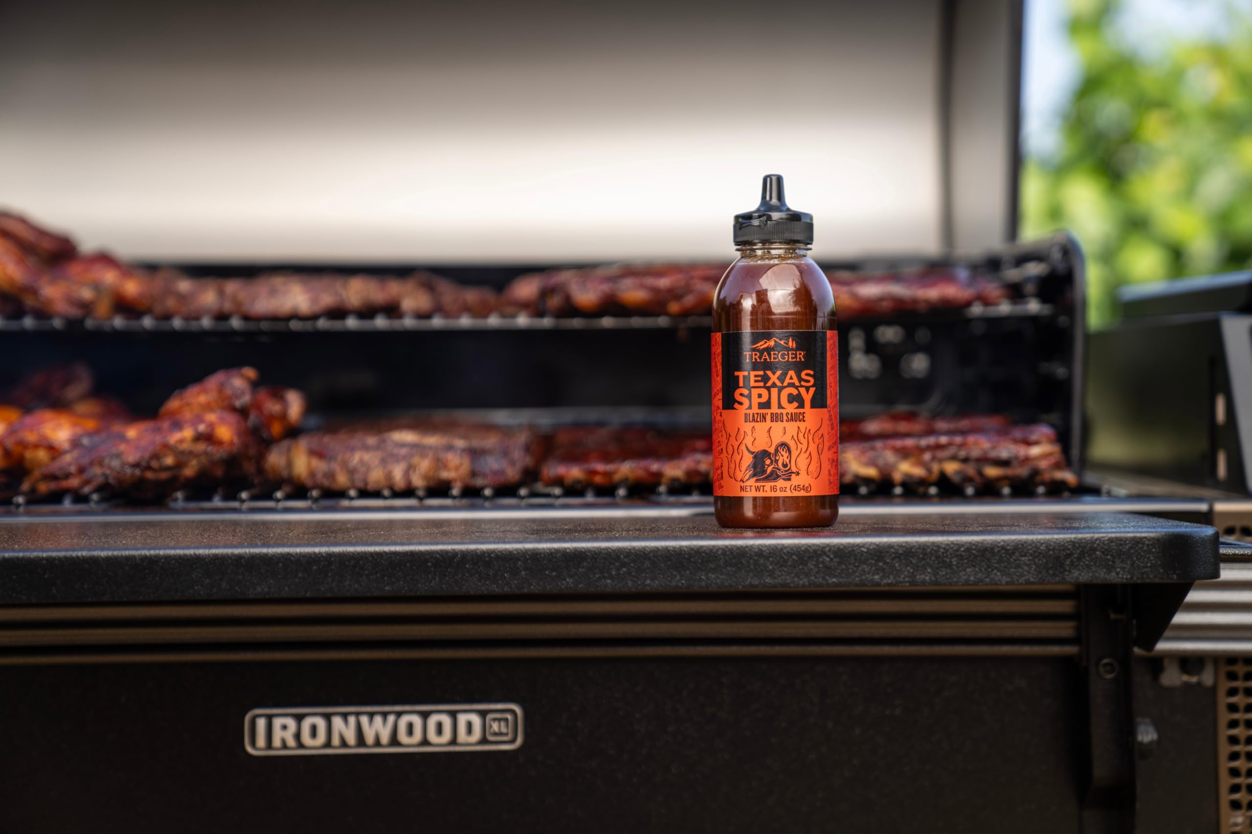 Traeger Texas Spicy BBQ Sauce on beef creates a bold grilled finish