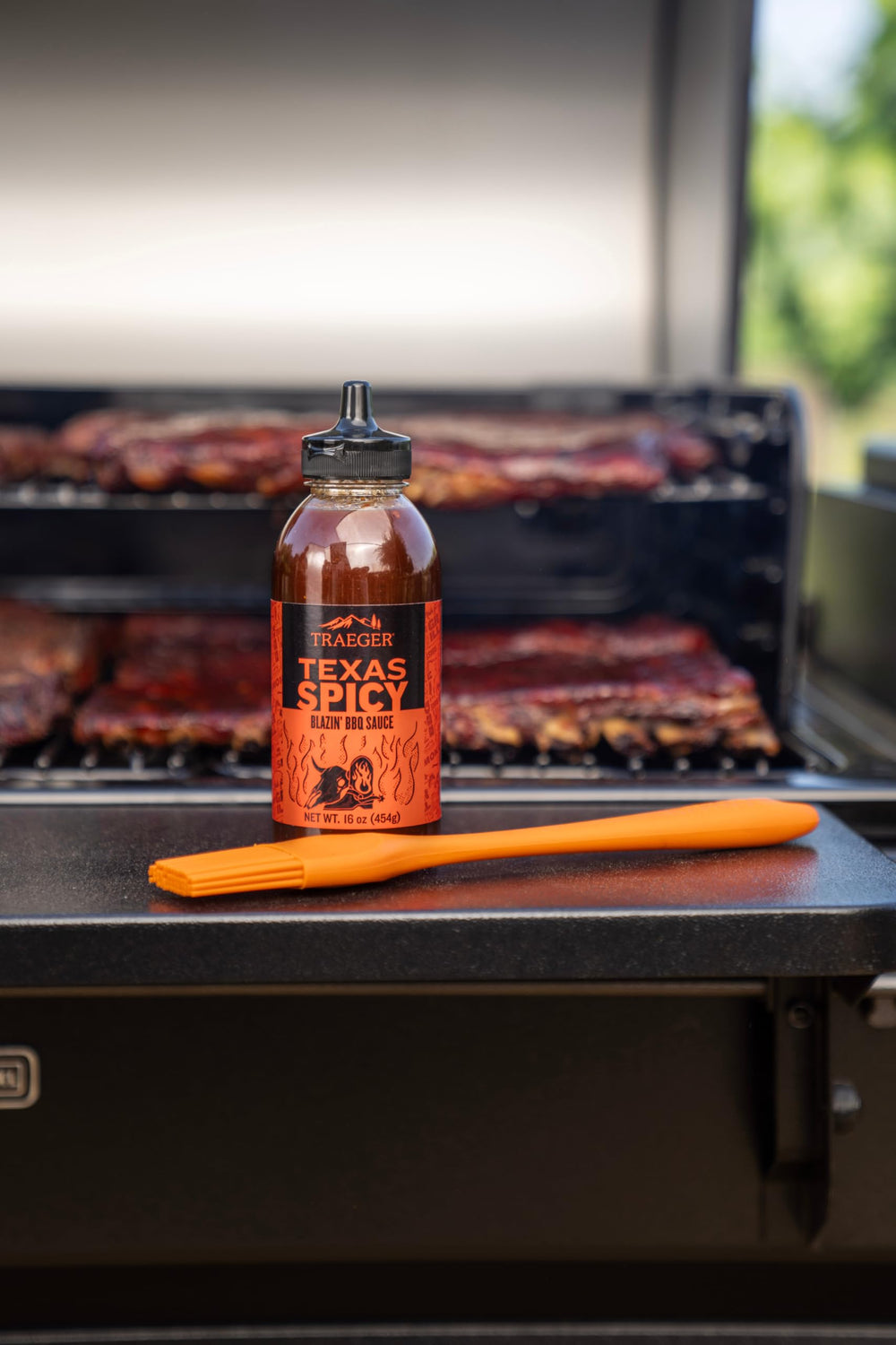 Traeger Texas Spicy BBQ Sauce over pulled pork provides versatile marinade and finishing sauce