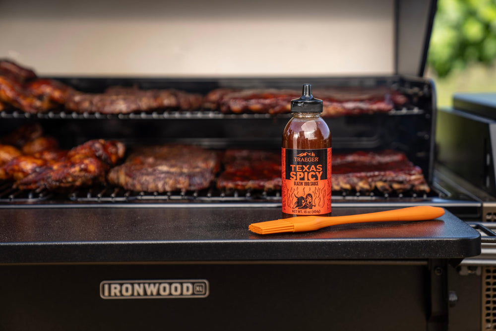 Traeger Texas Spicy BBQ Sauce on wings delivers bold peppery heat and glaze