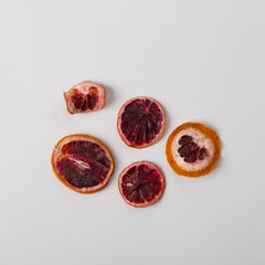 Traina Blood Orange Slices on a plate, ideal for beverages and baking.