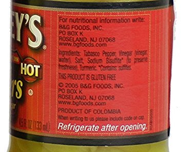 Trappey's Hot Peppers in Vinegar serving shot on plate, ideal topping for burgers or nachos