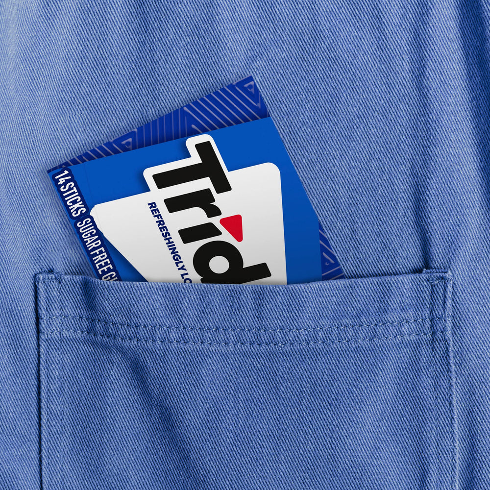 Trident Perfect Peppermint gum package in hand for quick breath.