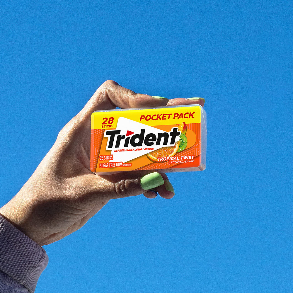 Trident Tropical Twist gift-basket setup suggests cheerful inclusion for celebrations.
