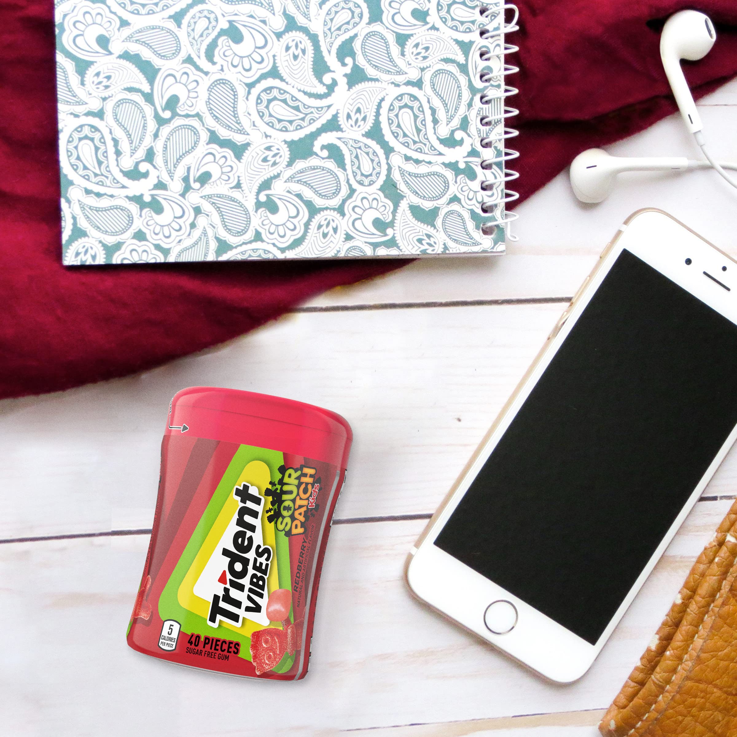 Trident Vibes Sour Patch Kids Redberry compact travel pack on table.