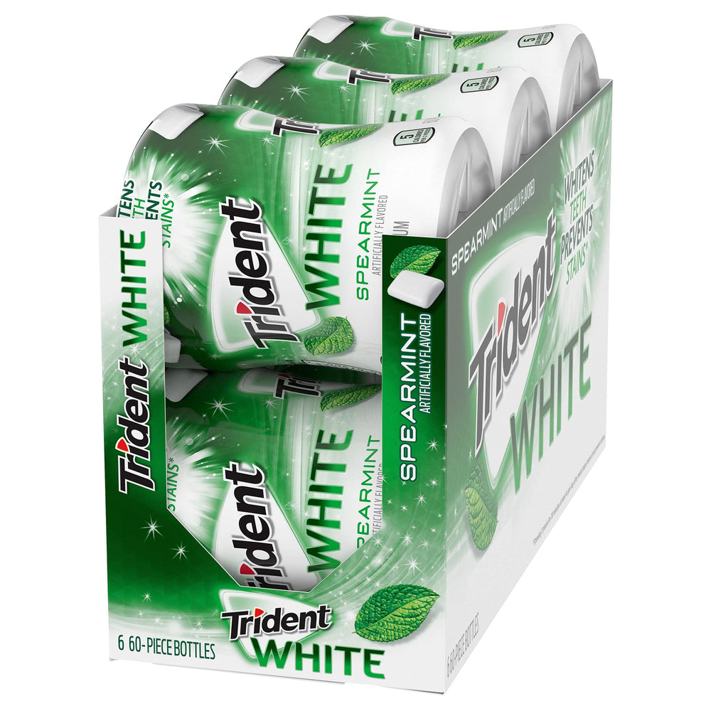Trident White Spearmint gum pieces close-up indicating after-meal use.