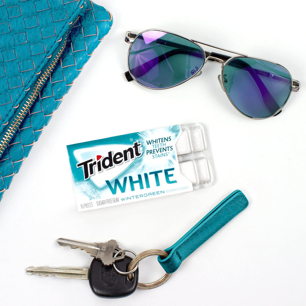 Trident White Wintergreen image showing a refreshing breath and cool aroma.