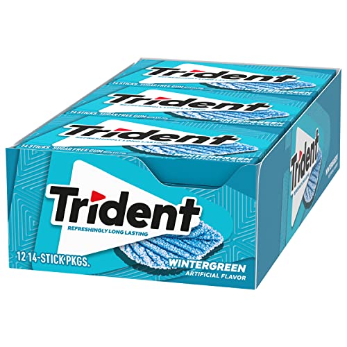 Trident Wintergreen Sugar Free Gum pieces lined up suggest routine use.