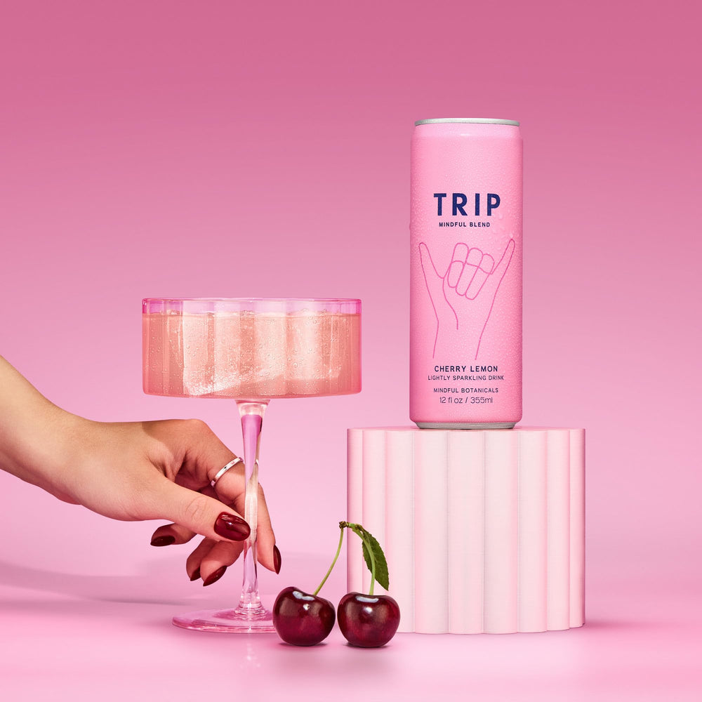 TRIP Lightly Sparkling glass with visible bubbles elevating everyday moments