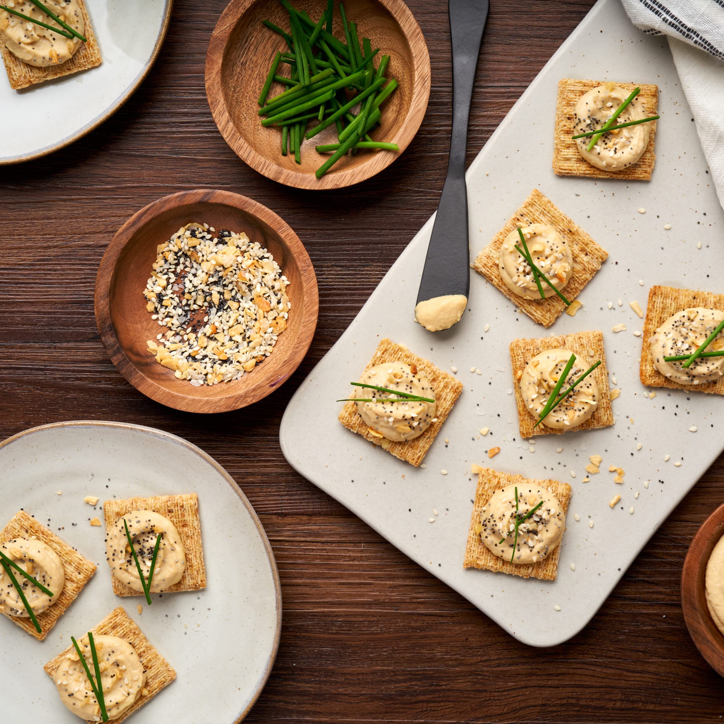 Triscuit with cheese topping showcasing a simple, satisfying snack.