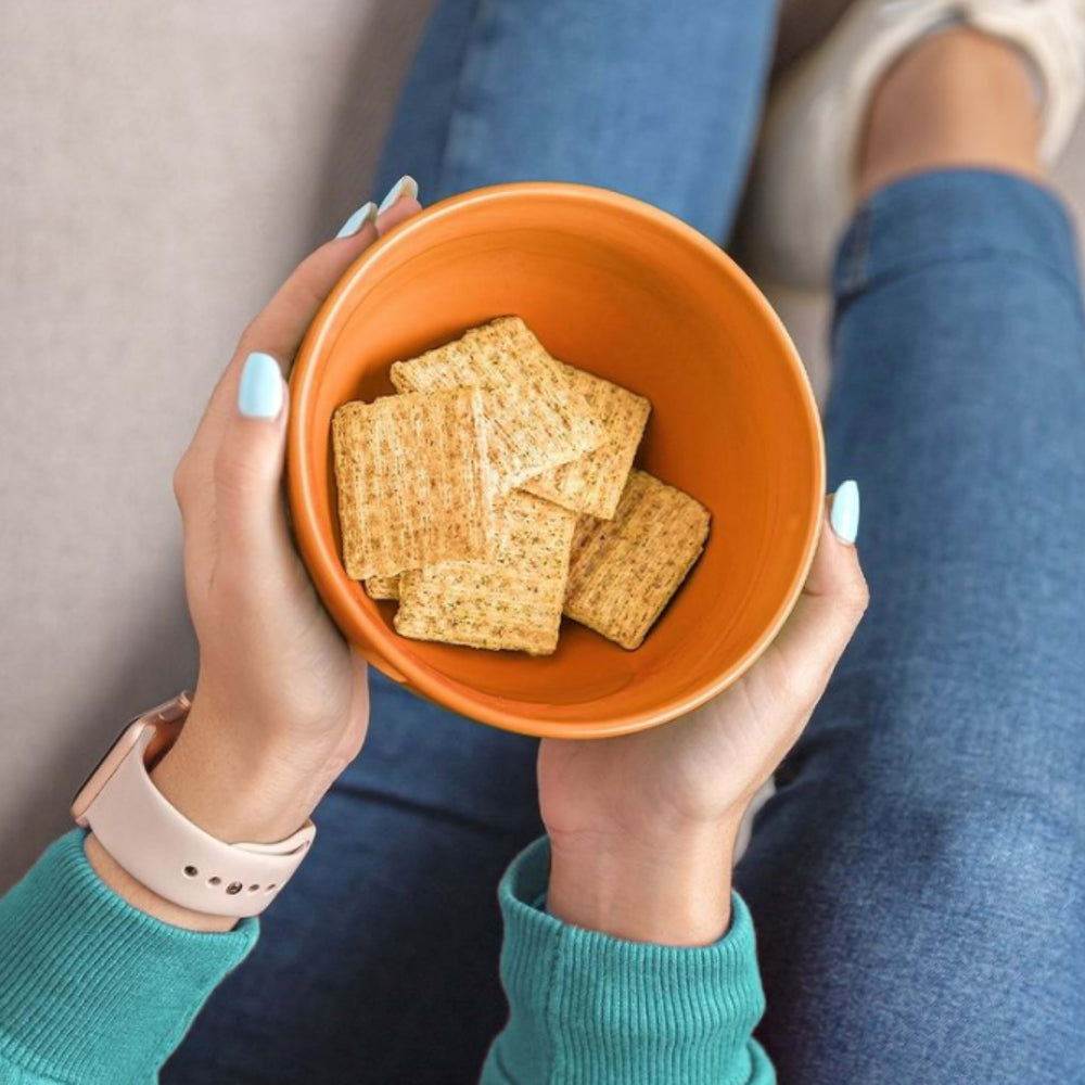 Triscuit crackers served with cheese and dips for a quick snack.