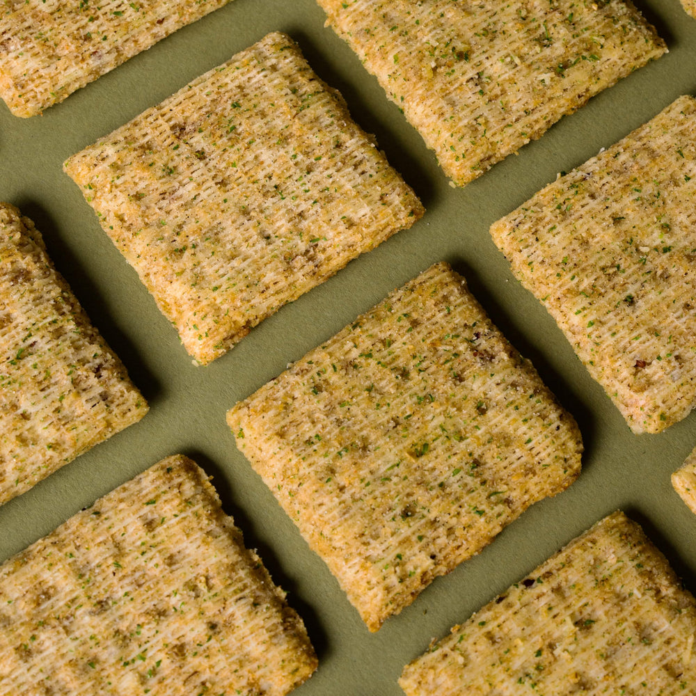 Triscuit dill-sea-salt-olive-oil-crackers in lunchbox suggest wholesome snacking.