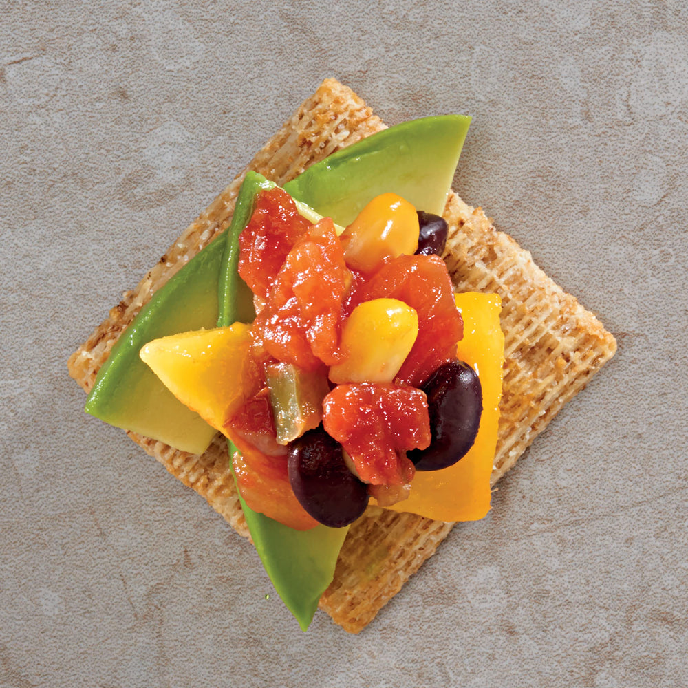 Triscuit Organic Original crackers in a travel bag for on the go snacking