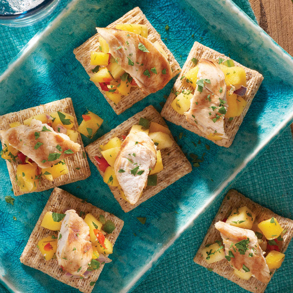 Triscuit Reduced Fat Whole Grain crackers party platter image highlights meat and cheese boards.