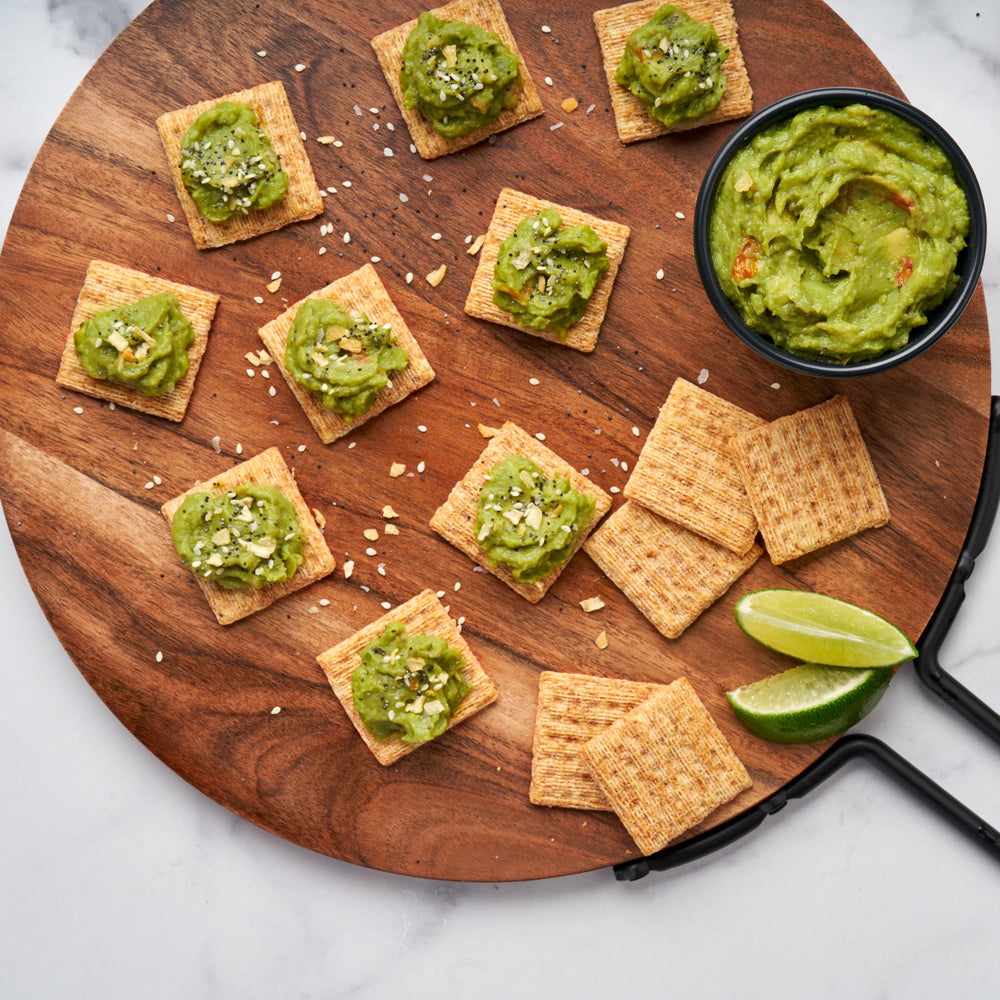 Triscuit Reduced Fat Whole Grain crackers lunch snack image emphasizes easy, on-the-go option.