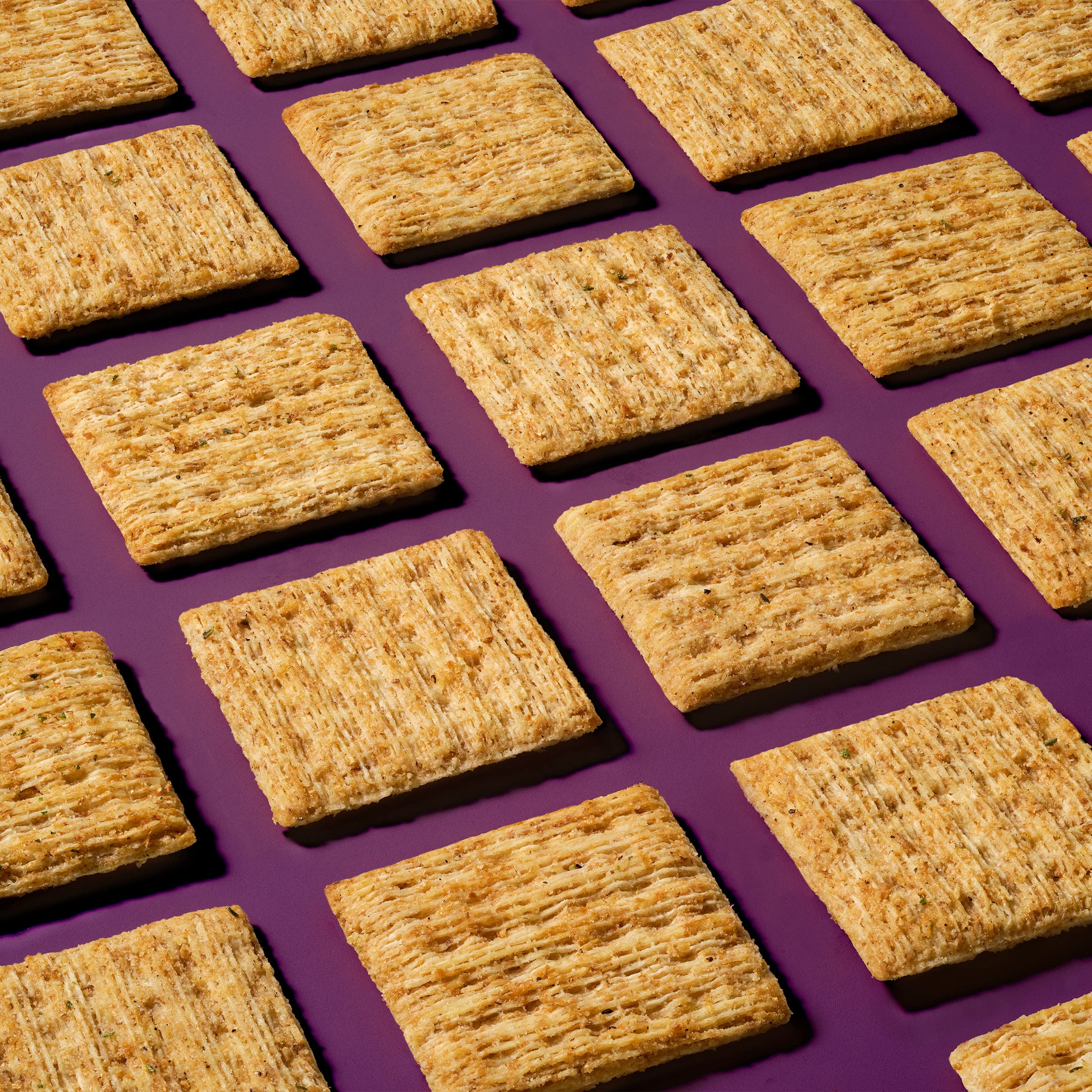 Triscuit crackers served with cheese on a board for pairing ideas