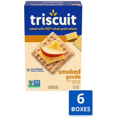 Triscuit Smoked Gouda crackers topped with cheese and fruit.