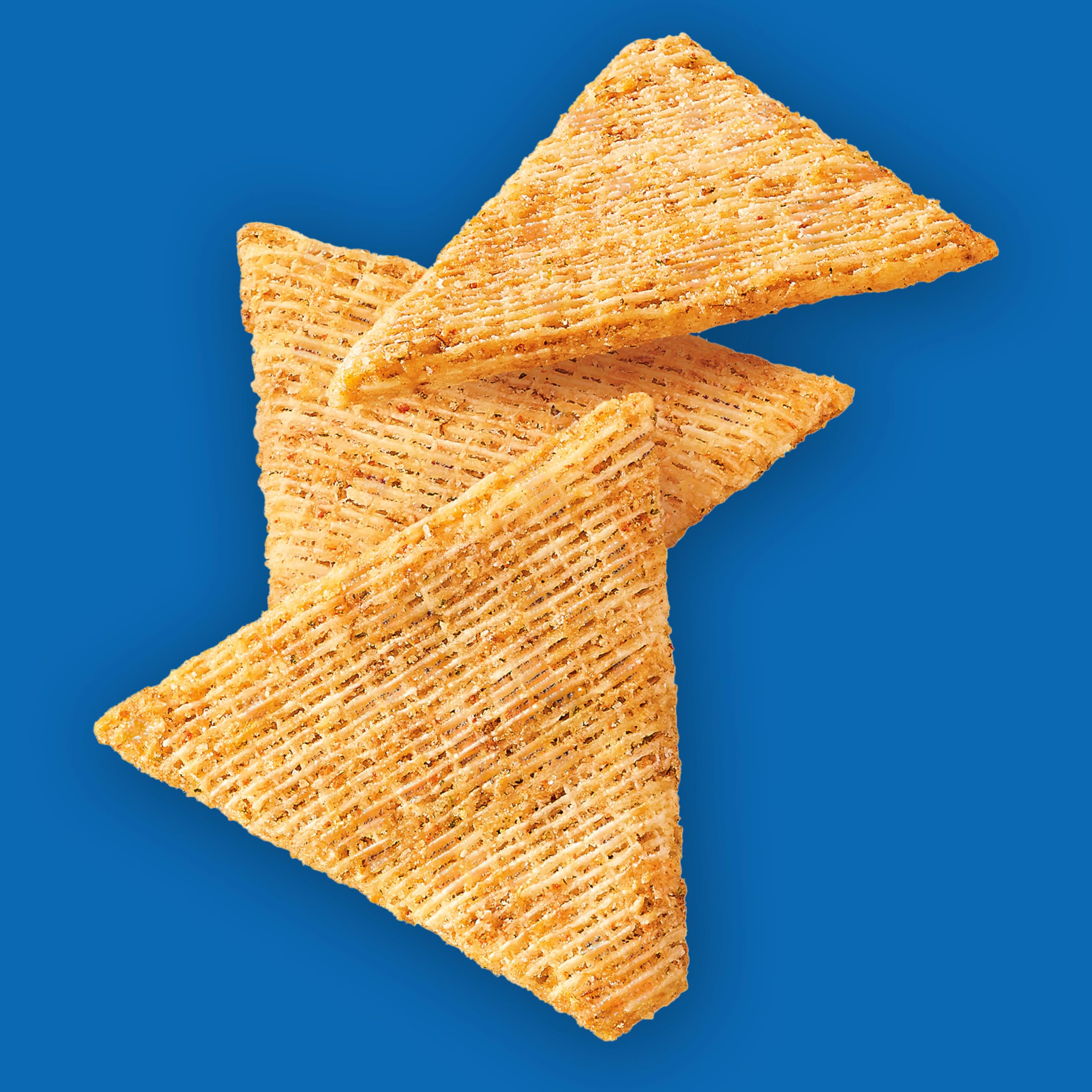 Triscuit Thin Crisps Original topped with cheese on a board