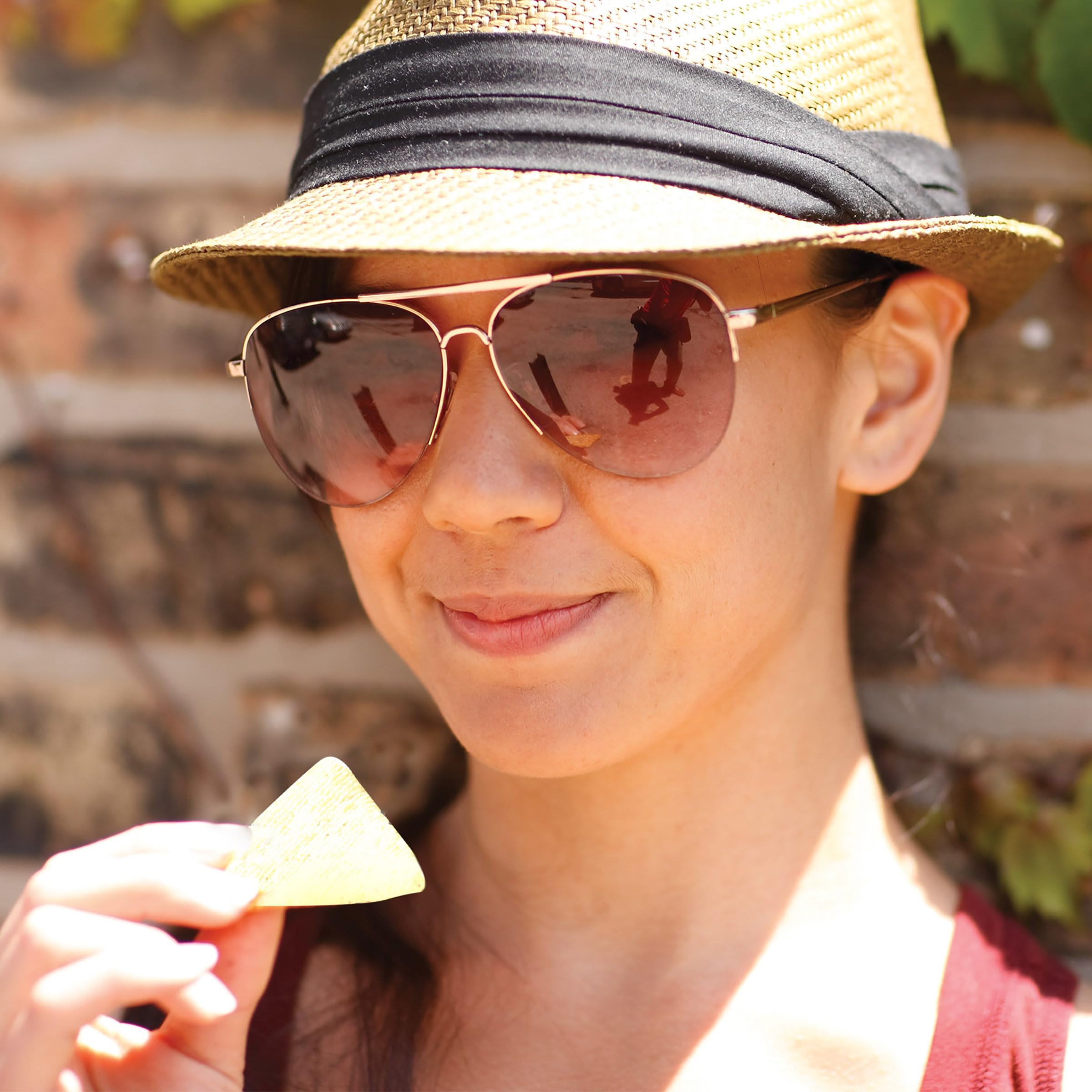 Triscuit Thin Crisps Zesty Jalapeño paired with fruit and cheese.