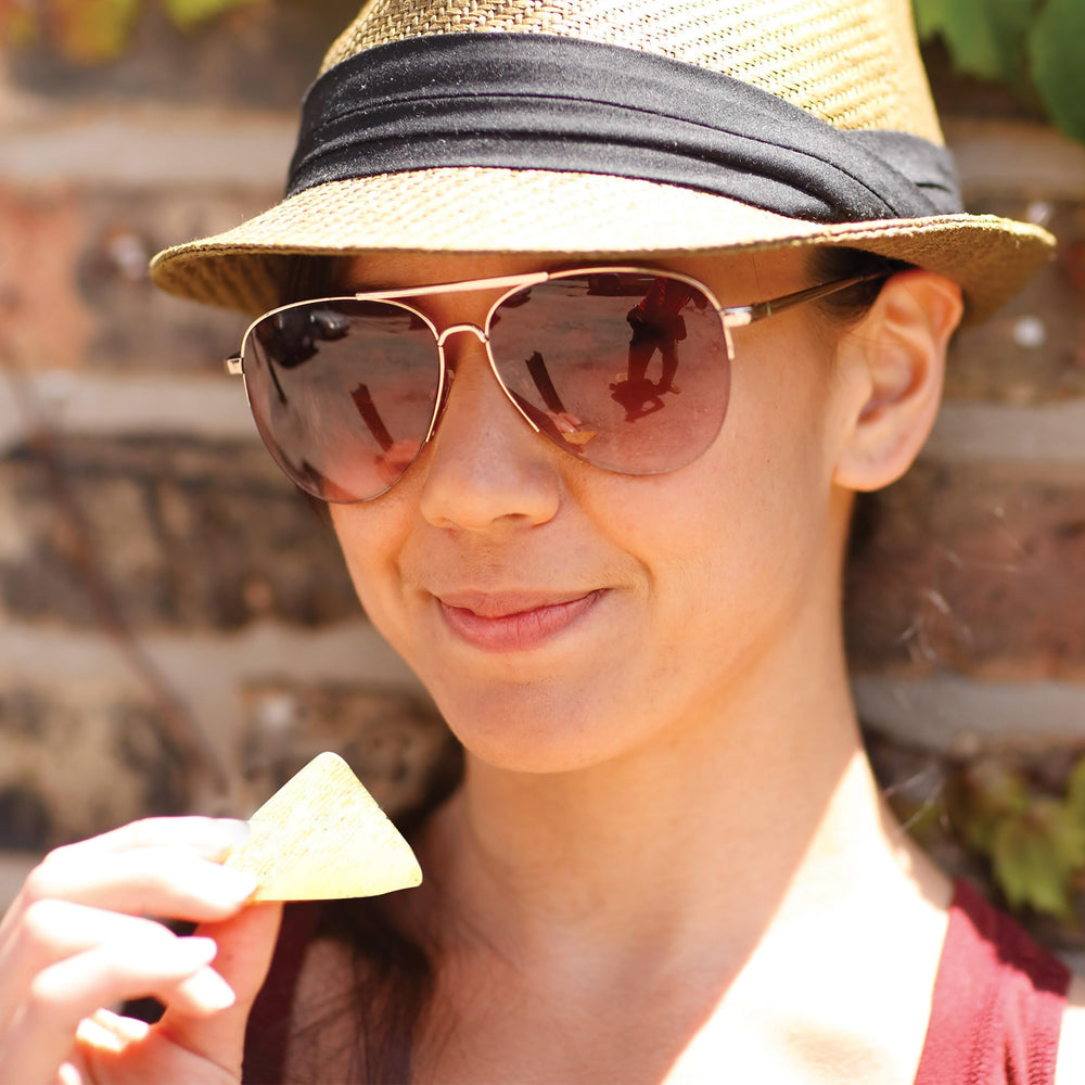 Triscuit Thin Crisps Zesty Jalapeño paired with fruit and cheese.