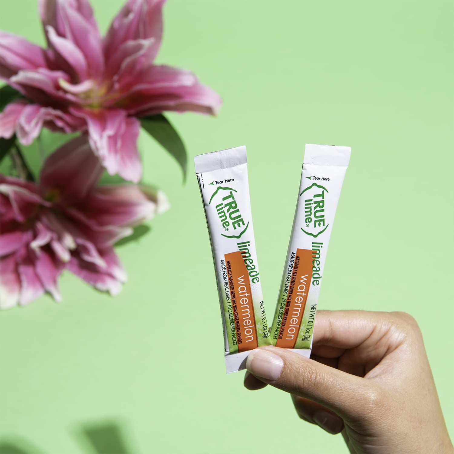 Fresh watermelon slices accompany True Citrus Aqua Fresca visuals