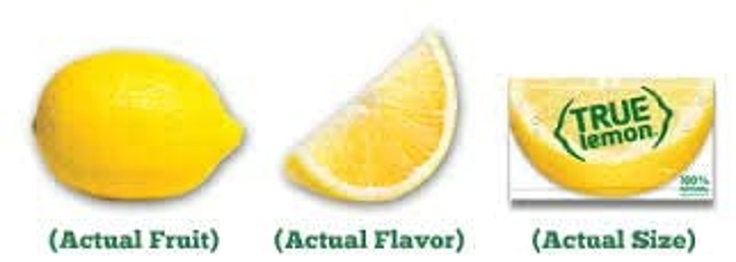Spoon with True Lemon crystals beside a cup