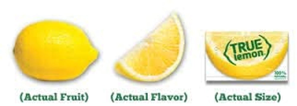 Spoon with True Lemon crystals beside a cup