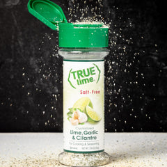 True Lime Lime, Garlic & Cilantro Spice Blend on rice and vegetables for fresh seasoning.
