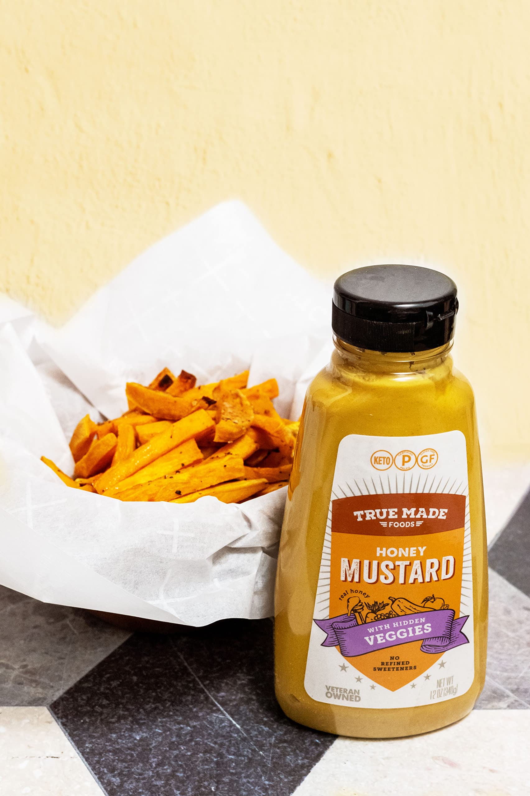 Kitchen scene featuring True Made Foods Honey Mustard in everyday cooking
