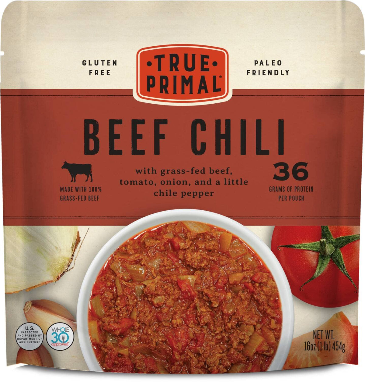 True Primal beef chili 8-pack on shelf, convenient ready-to-heat option.