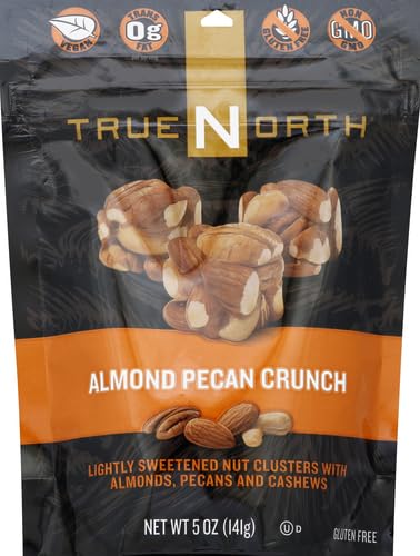 Close-up of almond-pecan-cashew clusters reveals a crunchy, satisfying texture.