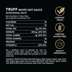 TRUFF White Truffle Hot Sauce being poured to enhance a dish