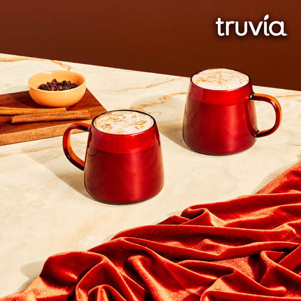 Measuring a quarter-teaspoon of Truvia for precise sweetness