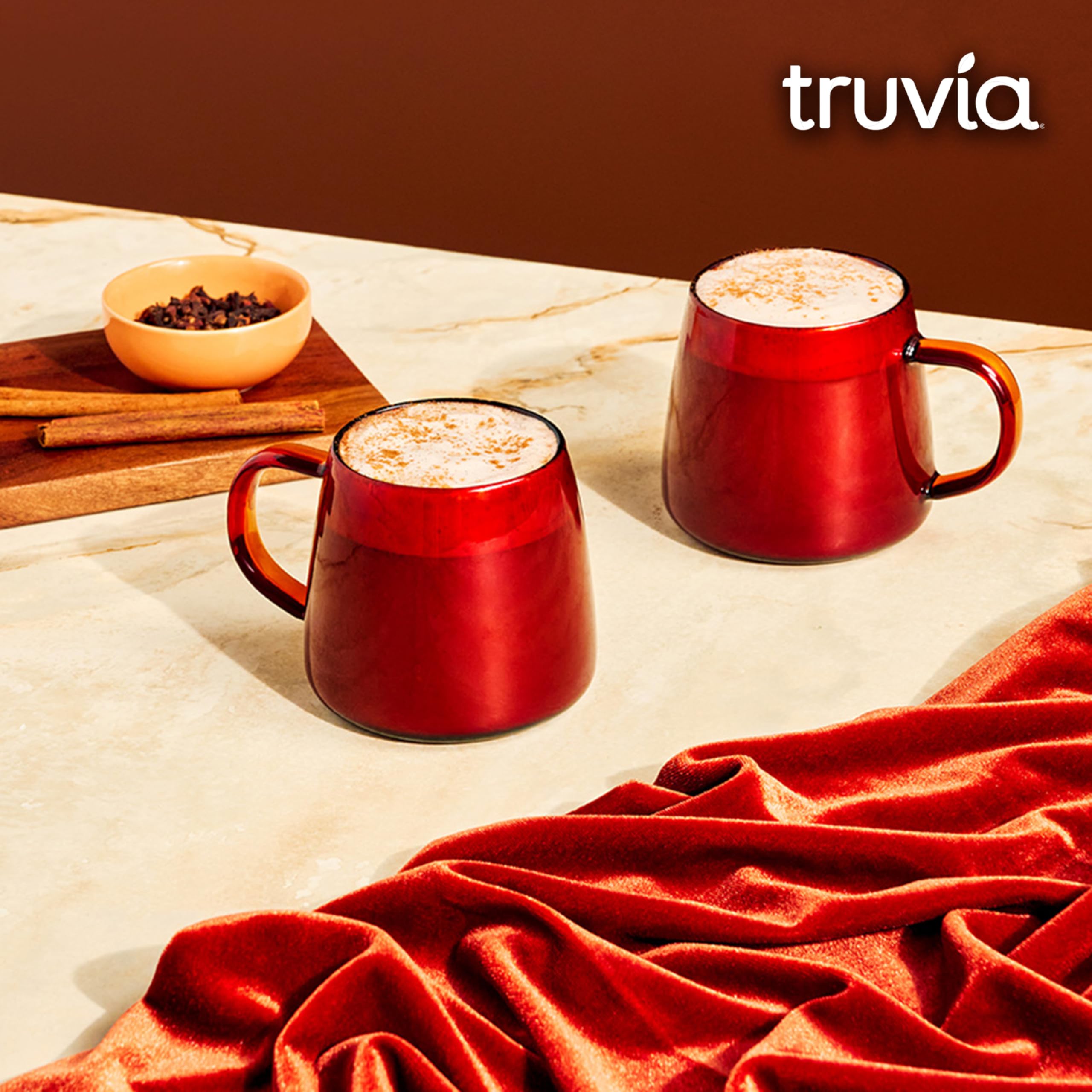 Jar beside coffee cup highlights versatile use in hot beverages