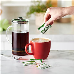 Truvia Original packet added to coffee for a zero-calorie boost