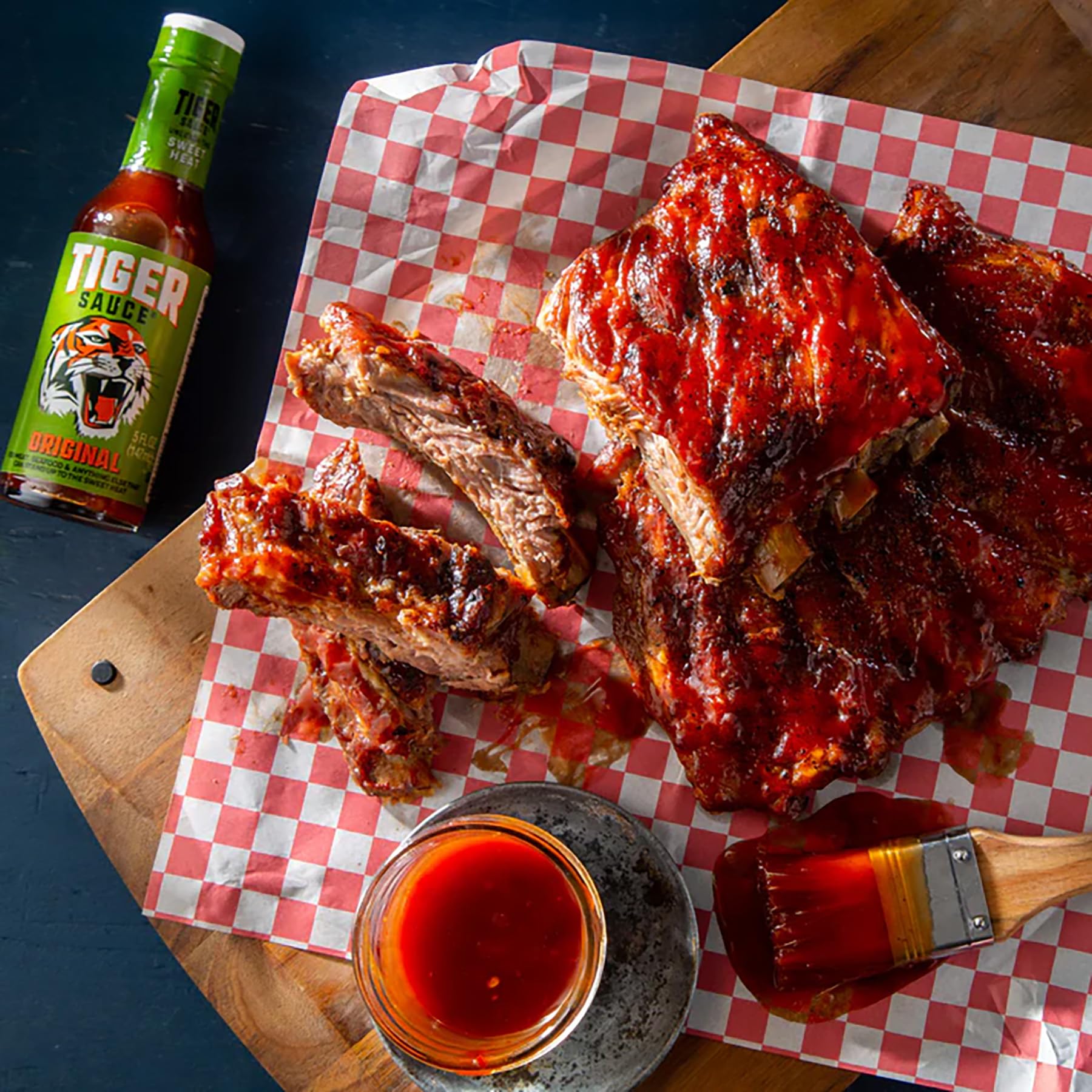 Try Me Tiger Sauce sizzling plate, visualizing a bold finish.