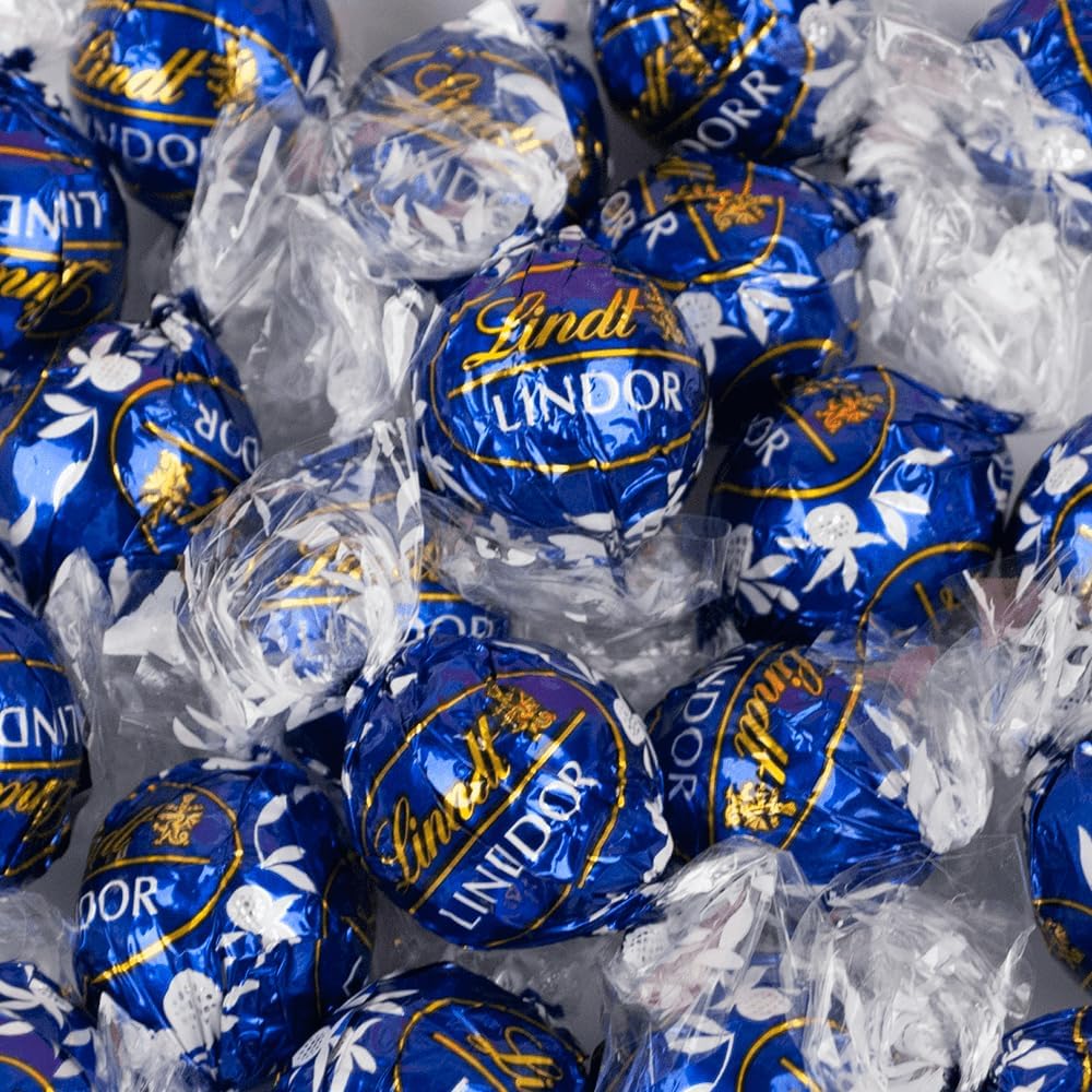 Tundras LindtTruffles close-up center, silky interior and cocoa shell.