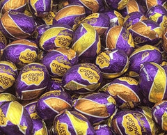 Tundras caramel-filled mini eggs, milk chocolate, individually wrapped, ideal for parties or lunchbox treats.