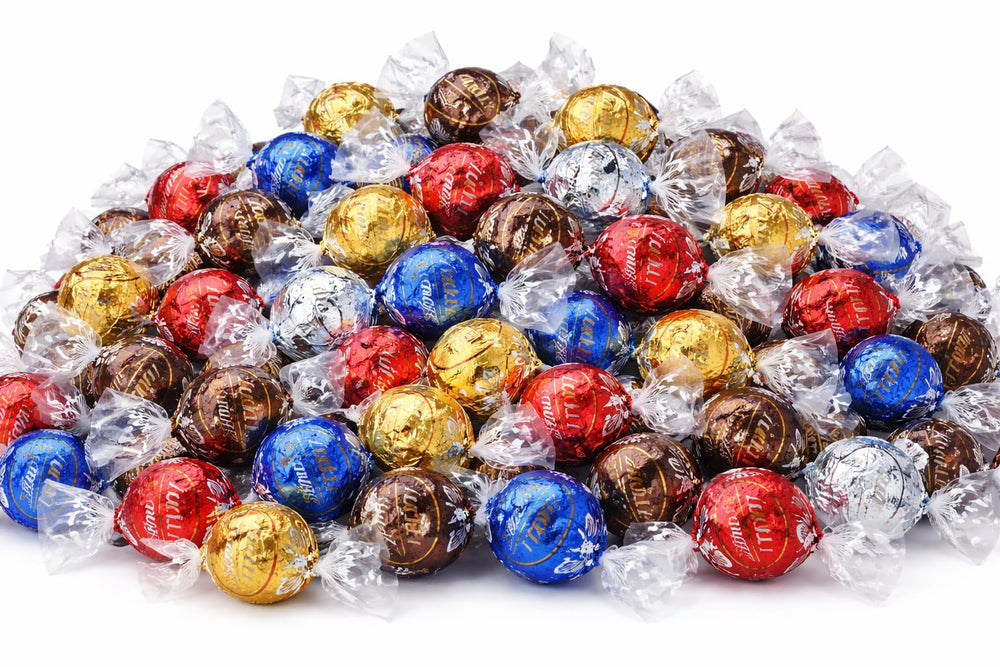 Tundras Lind.t Truffles milk-shell-centre showcases creamy center ideal for after-dinner treats.