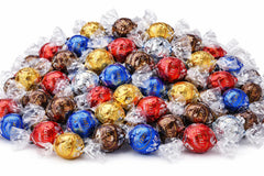 Tundras Lind.t Truffles milk-shell-centre showcases creamy center ideal for after-dinner treats.