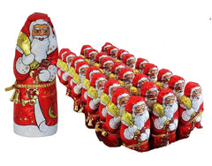 Close-up of smooth Lindt milk chocolate Santa in shimmering foil.