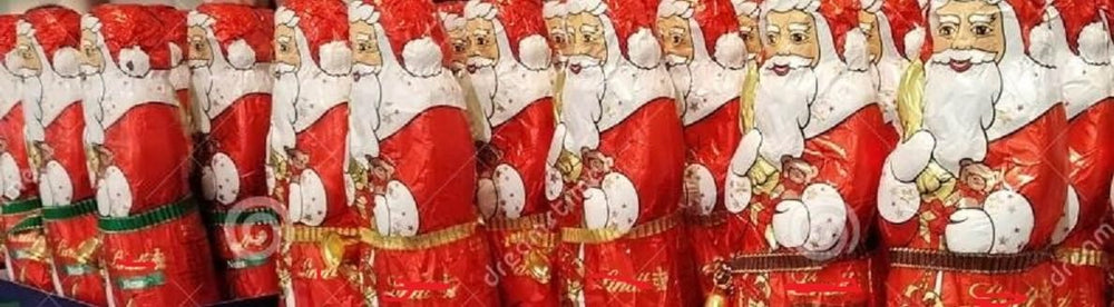 Festive foil-wrapped Lindt Santa chocolates for holiday celebrations.
